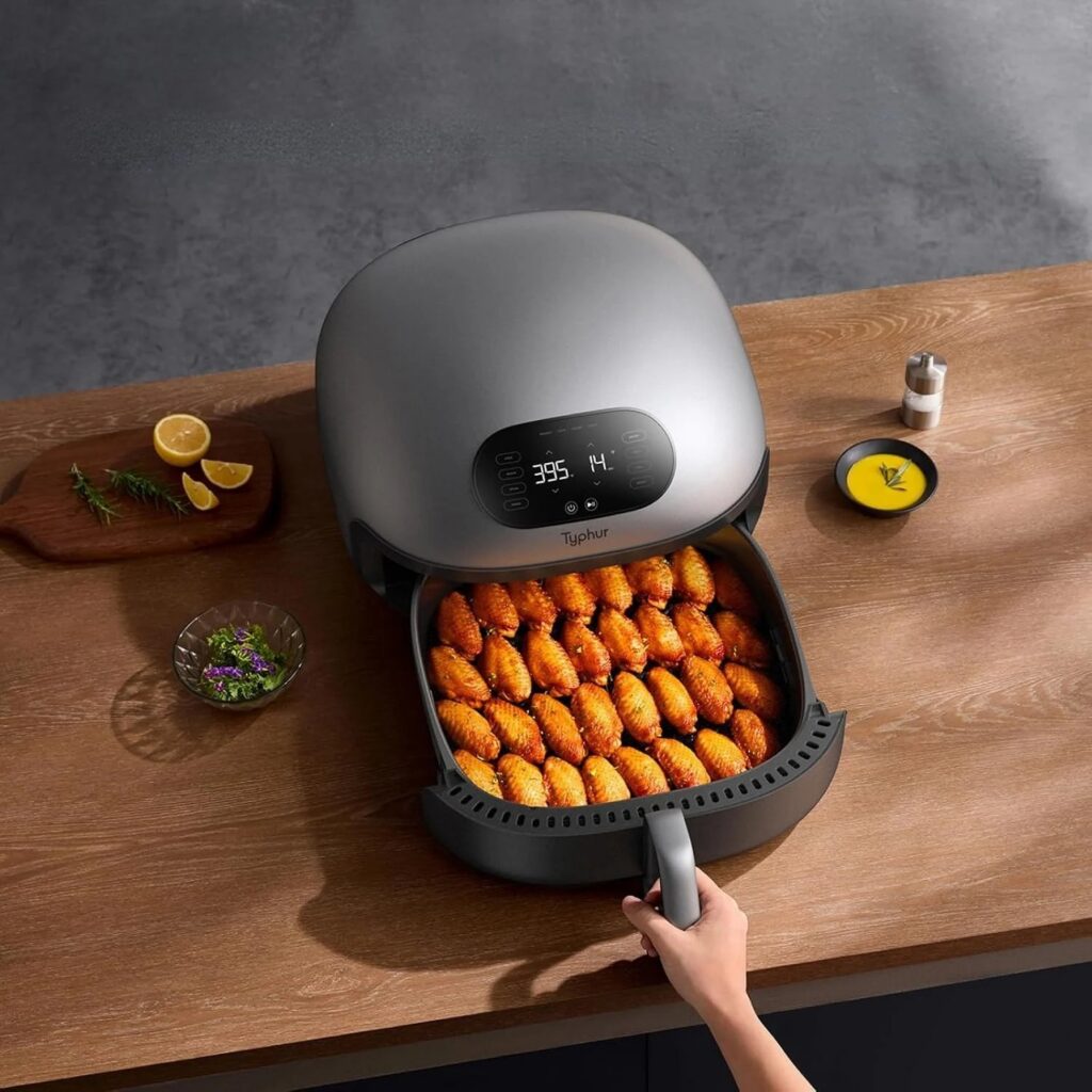 Typhur Dome 2 smart air fryer with a wide basket of chicken wings